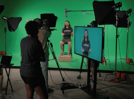 The MMM team at work in the studio using a green screen.